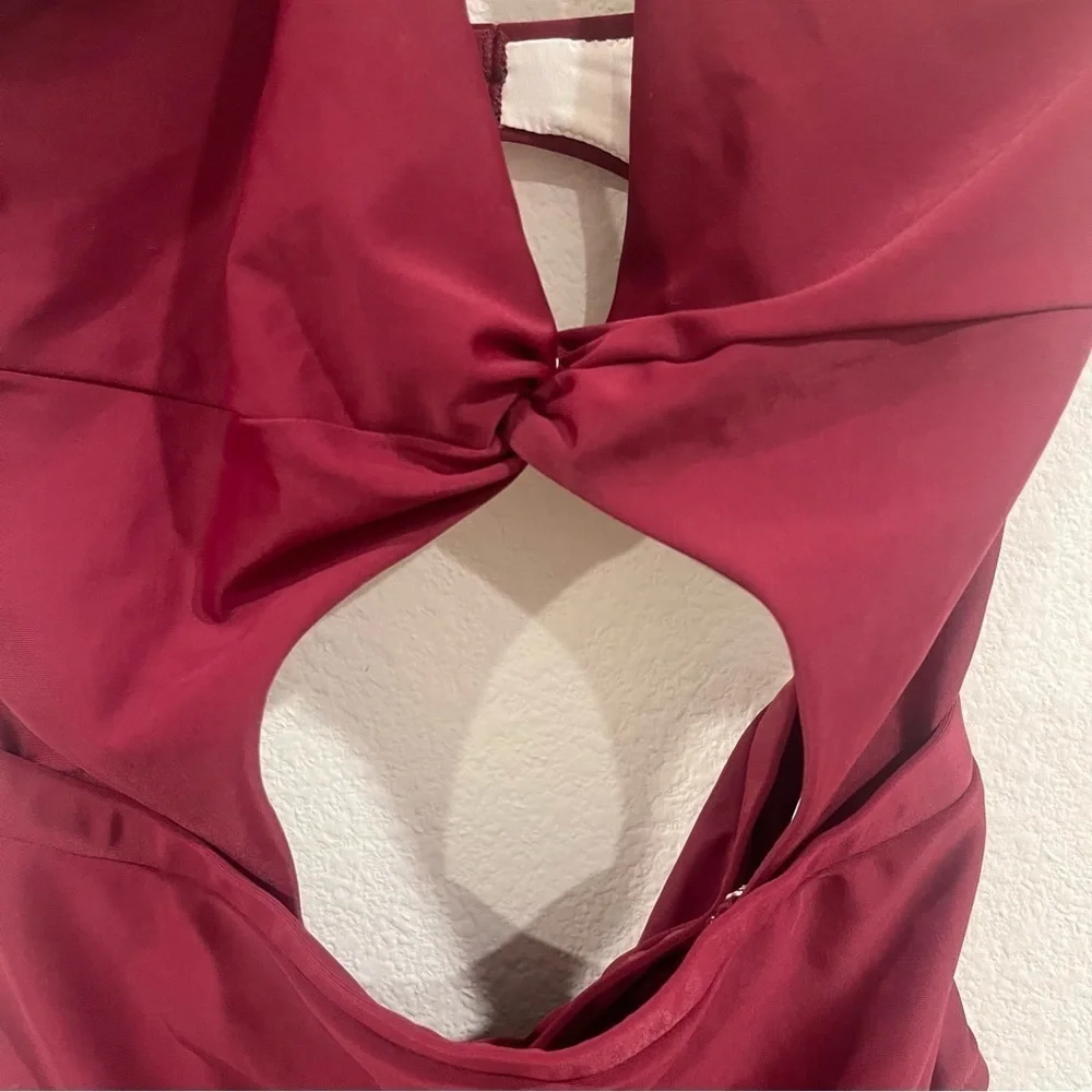 6 Shore Road maroon one piece with cut out and tie neck size medium